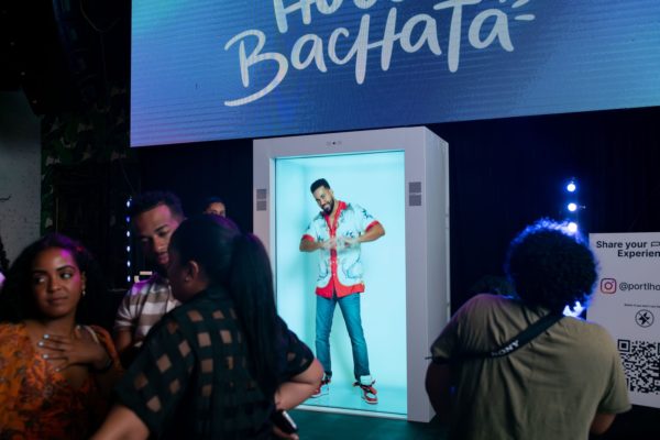 An image showing singer Romeo Santos welcomed guests in hologram form via PORTL, the interactive holoportation technology.